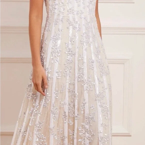 NEEDLE AND THREAD long, sequin gown.